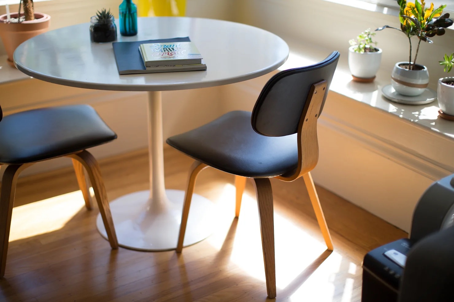 Two empty chairs at table